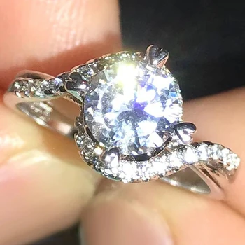 Huitan מעולה טוויסט גביש עיצוב דמוי יהלום טבעות לנשים חדשה הגעה לחתונה טבעות אירוסין צבע כסף תכשיטים